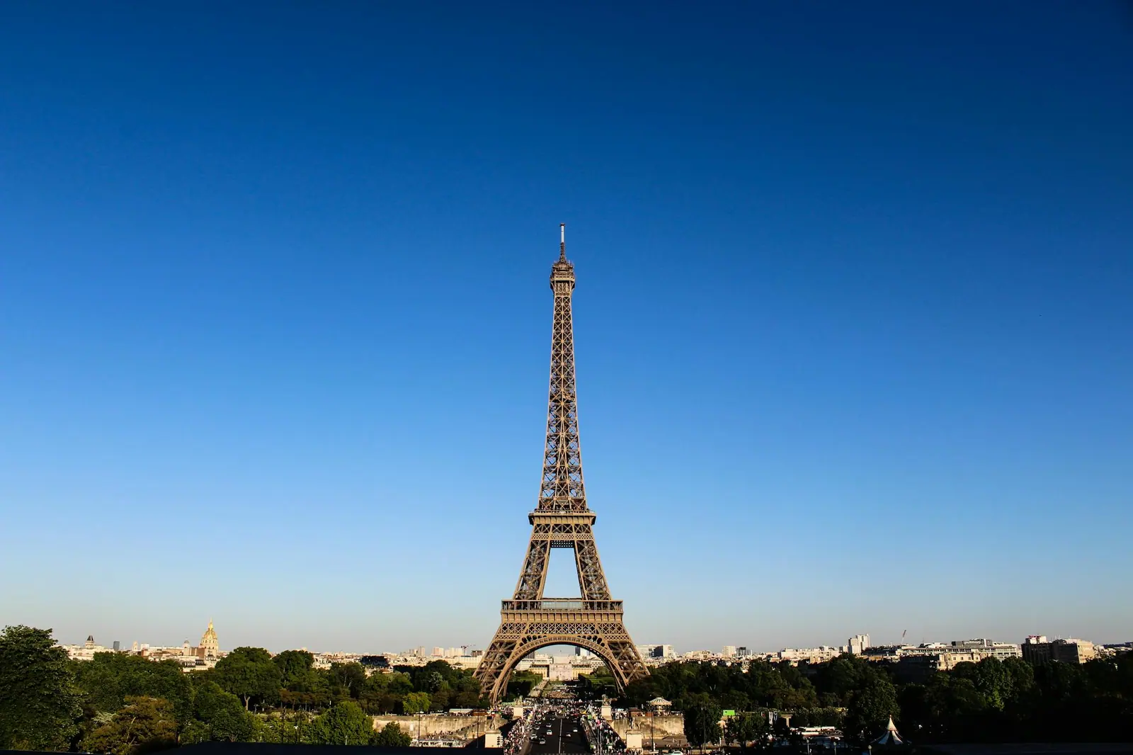 Stunning daylight shot capturing the eiffel tower with clear blue skies in paris
